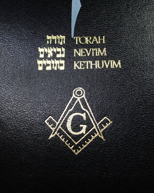 Black book cover with gold text and symbols, including 'Torah Nevum Kethuvim' and a Masonic emblem.